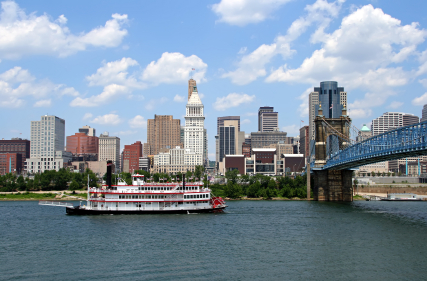 Cincinnati Skyline and Replica Steamboat on Ohio River Cincinnati Ohio USA